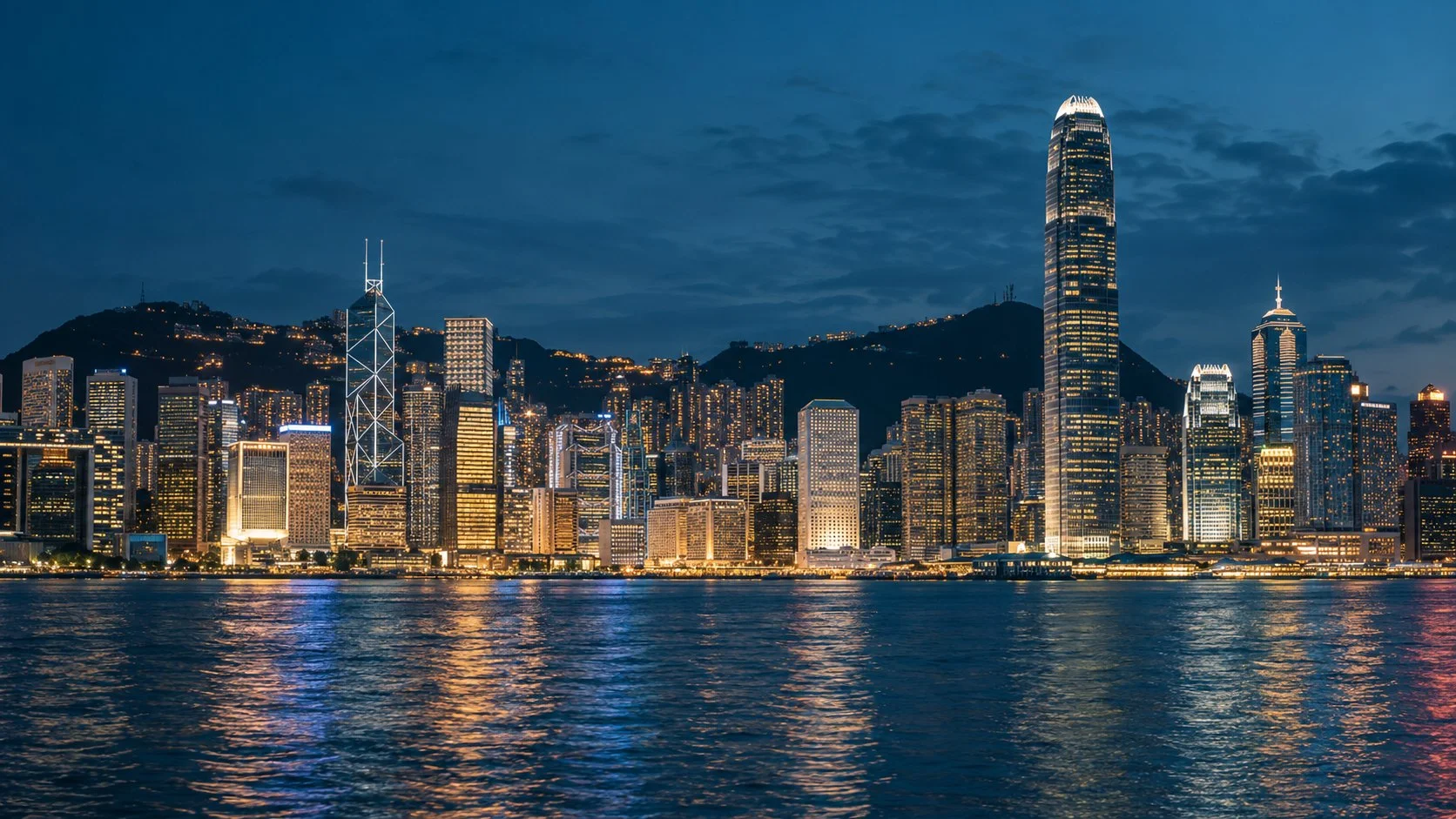 Harbour and city skyline at blue hour